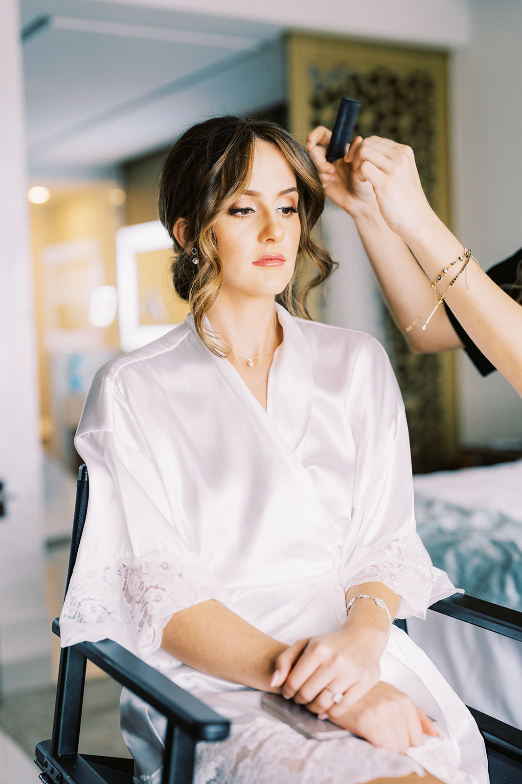 
  
  Bride in Los Cabos getting hairstyle and makeup by Bridal Glam team ...
