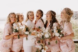 Blog 1 Curled ends on shoulder-length hair for effortless bridesmaid match. Sunset Los Cabos - Bridal Glam